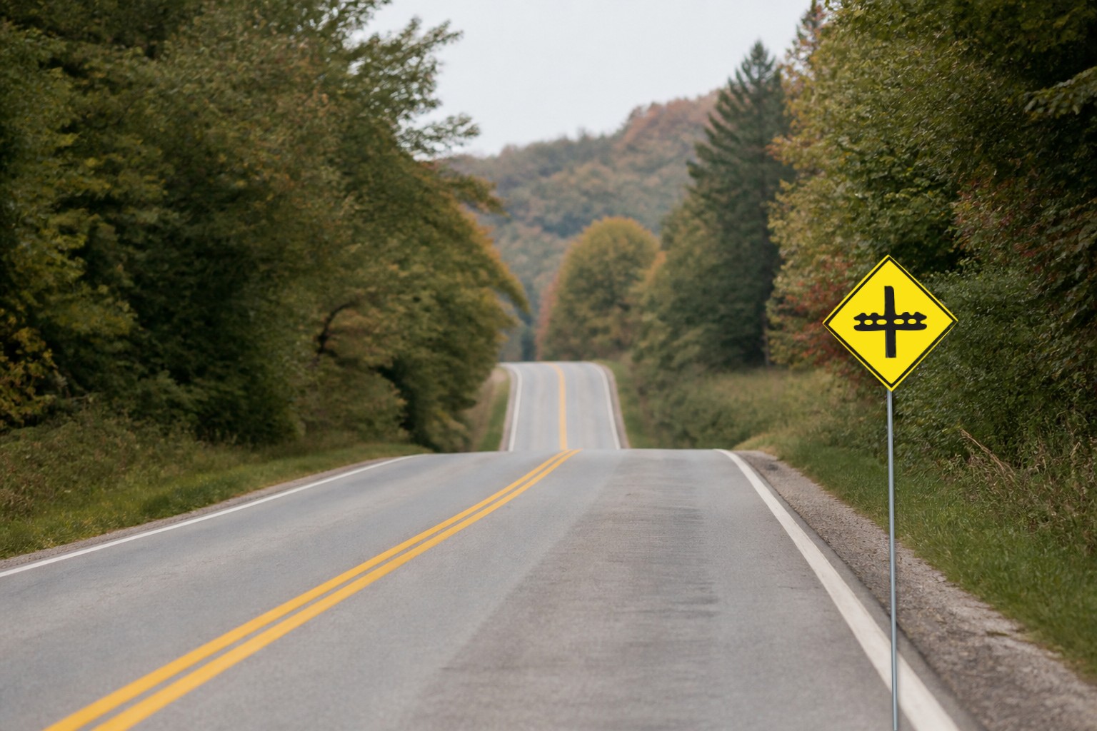 Ontario road sign: Railway crossing ahead