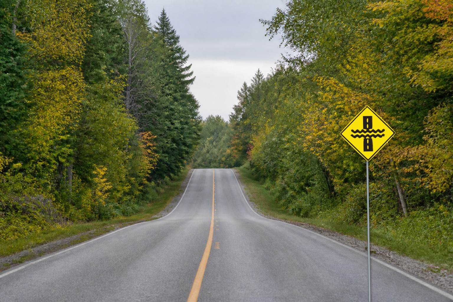Ontario road sign: Water may flow over the road ahead